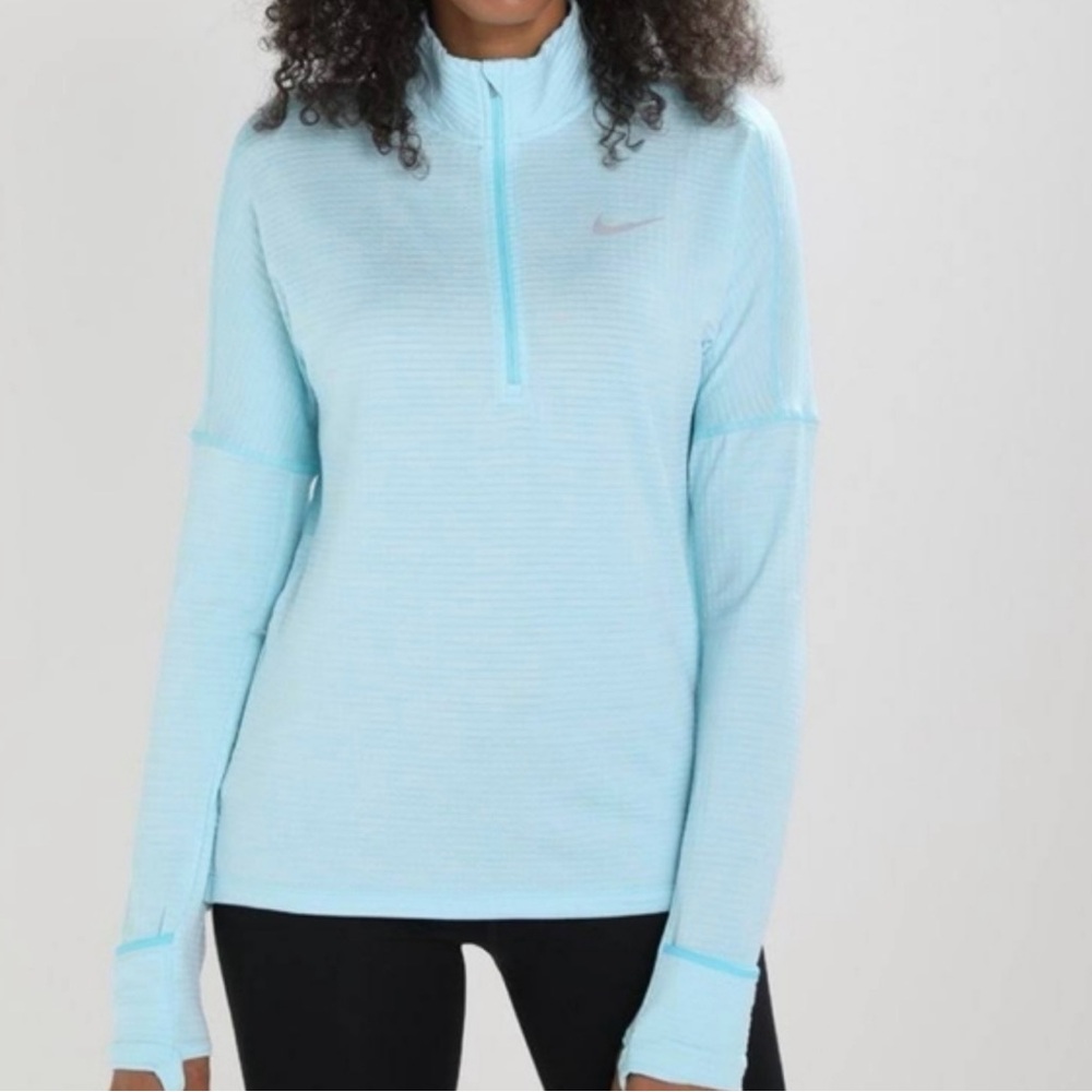 Nike women light blue half zip running top Size M